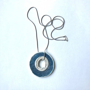 Oyster Lid and Silver Pendant