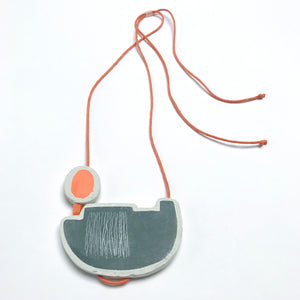 Boat necklace with orange buoy